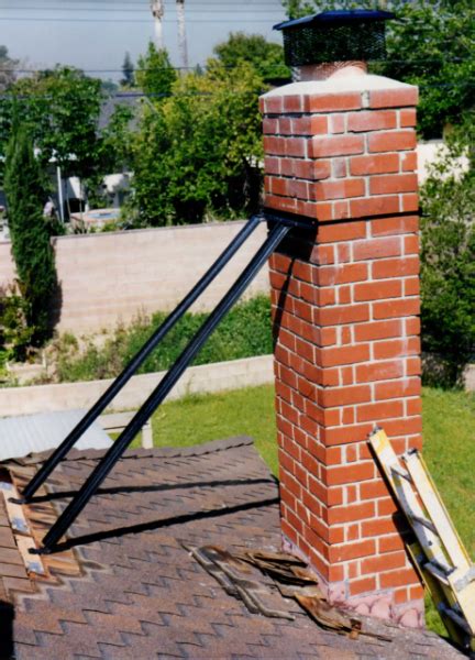 metal chimney roof support bracket|existing chimney strap brace.